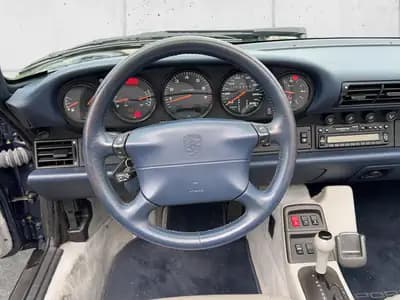 Porsche 911 Carrera 4 Cabriolet — Roadster légendaire 1995, transmission intégrale et toile — Miniature 10